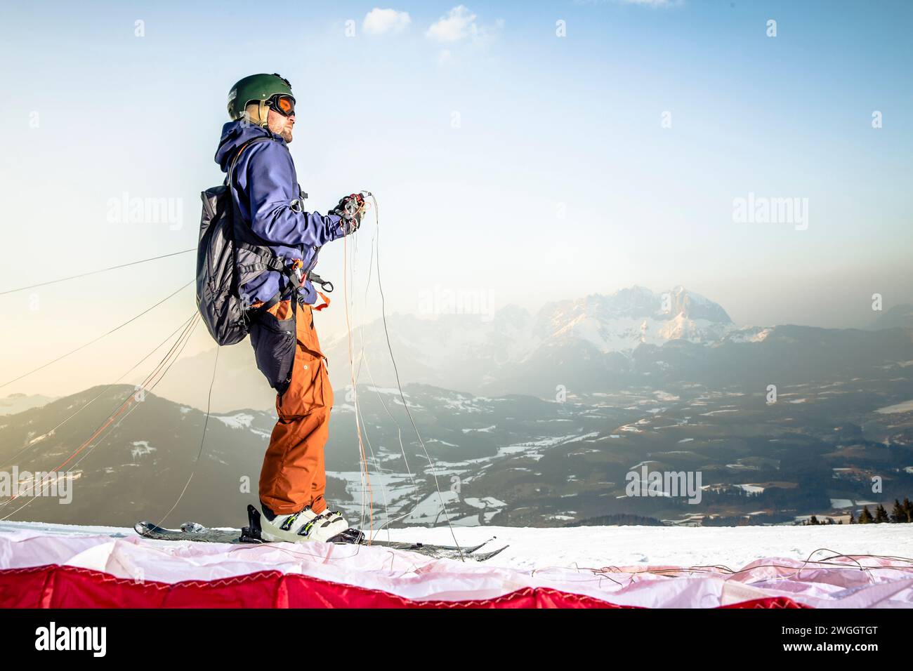 Man preparing before speed flying in Austrian Alps, Kitzbuhel, Tyrol, Austria Stock Photo