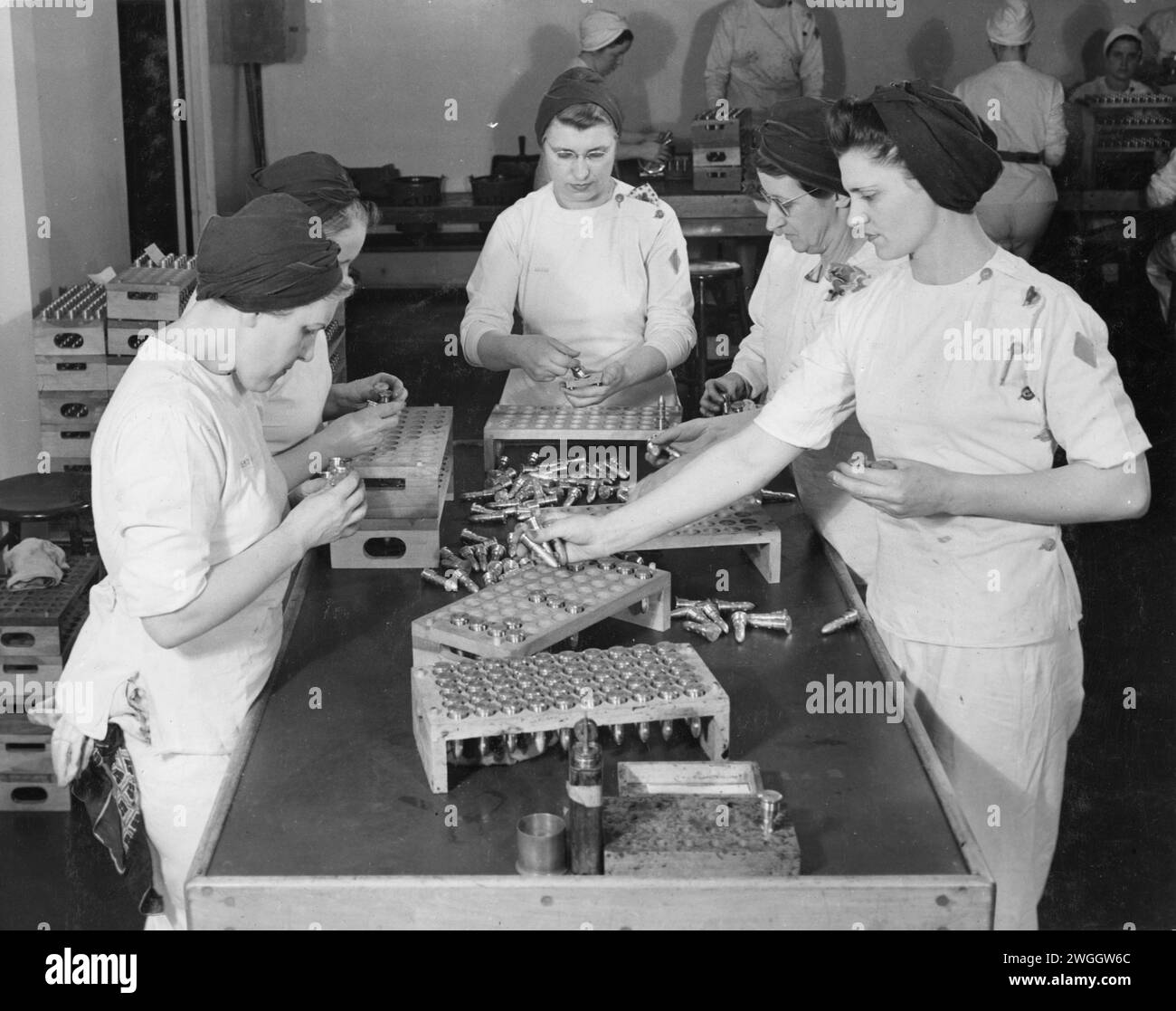 Women working at General Engineering Company munitions factory during the Second World War  in Scarborough, Ontario circa 1943 Stock Photo