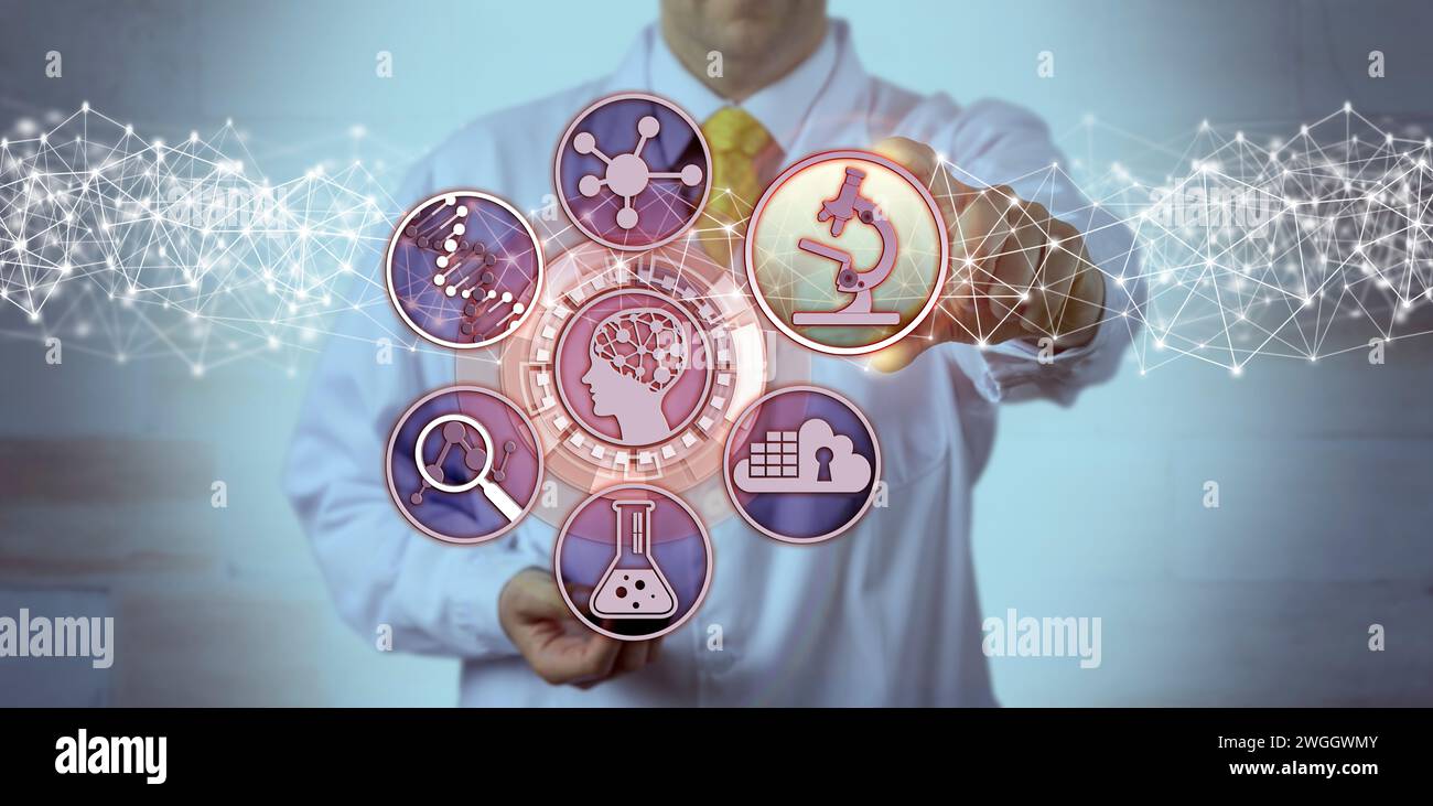 Unrecognizable male scientist is plugging a microscopy app into a brain study interface. Science concept for biosciences, molecular engineering, bioen Stock Photo