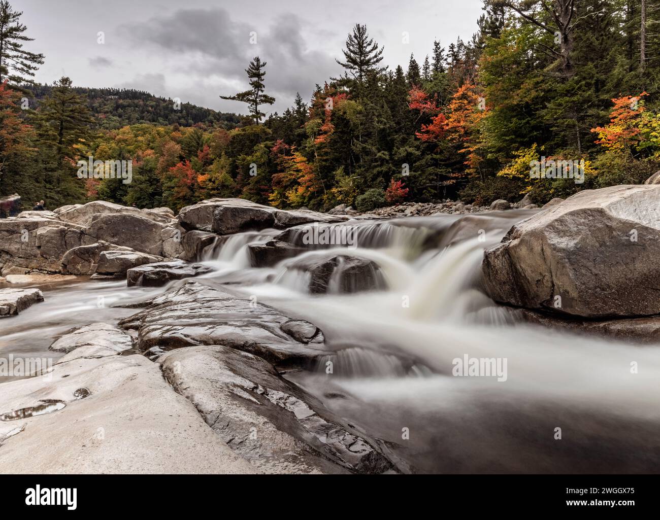 Waterfall in autumn in New Hampshire's White Mountains Stock Photo