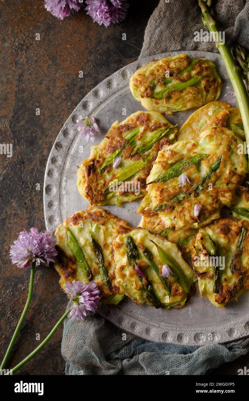 Organic pancakes with asparagus and onions Stock Photo