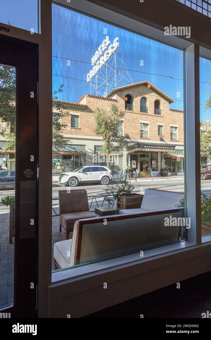 View through window looking out at hotel Congress vertical Stock Photo