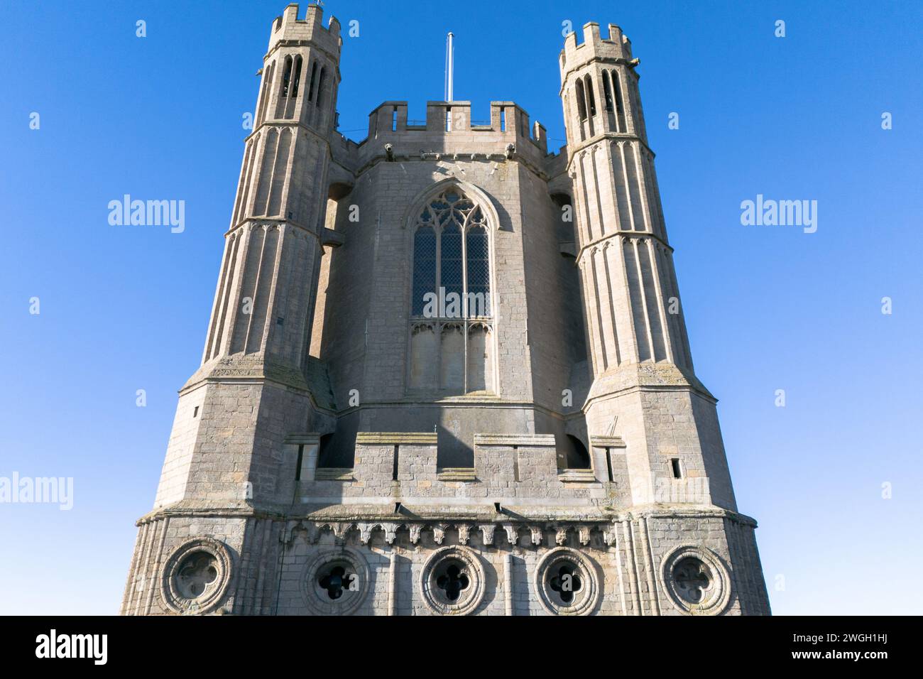 Elevated view of the historic West Tower at Ely Cathedral ...