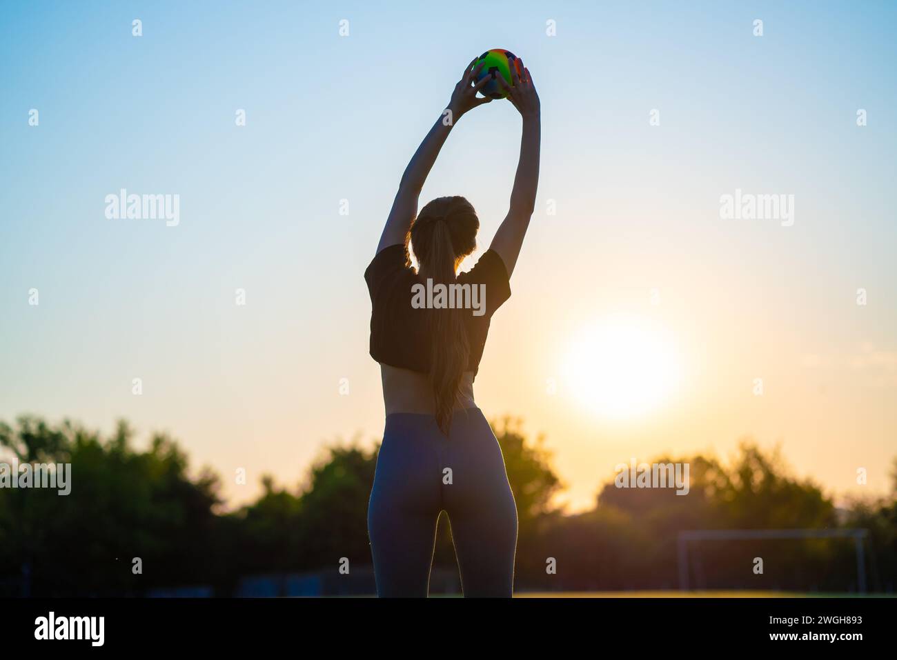 Active woman raising arms hi-res stock photography and images - Alamy