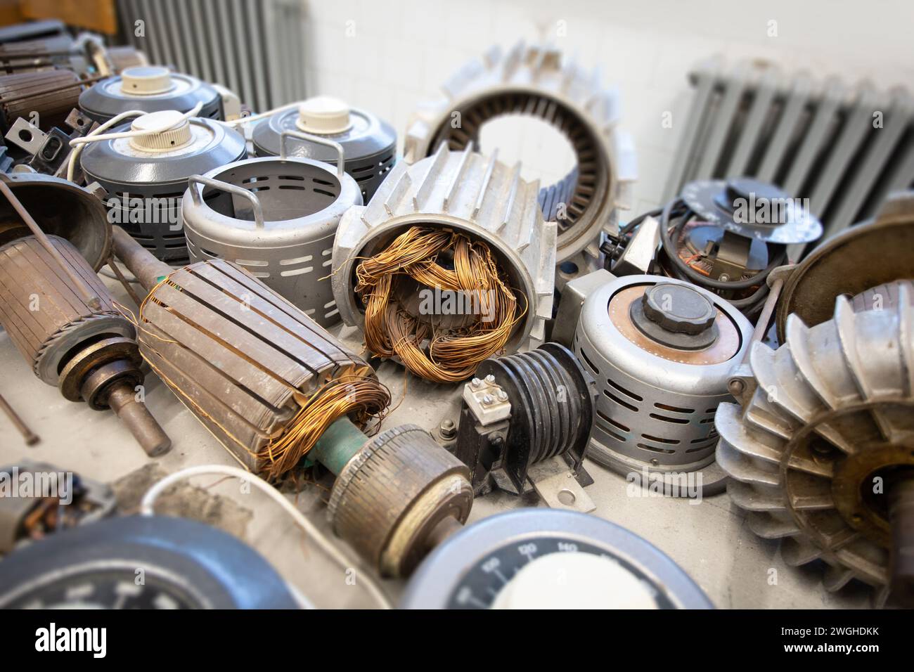 various types of old electric motors on table Stock Photo Alamy