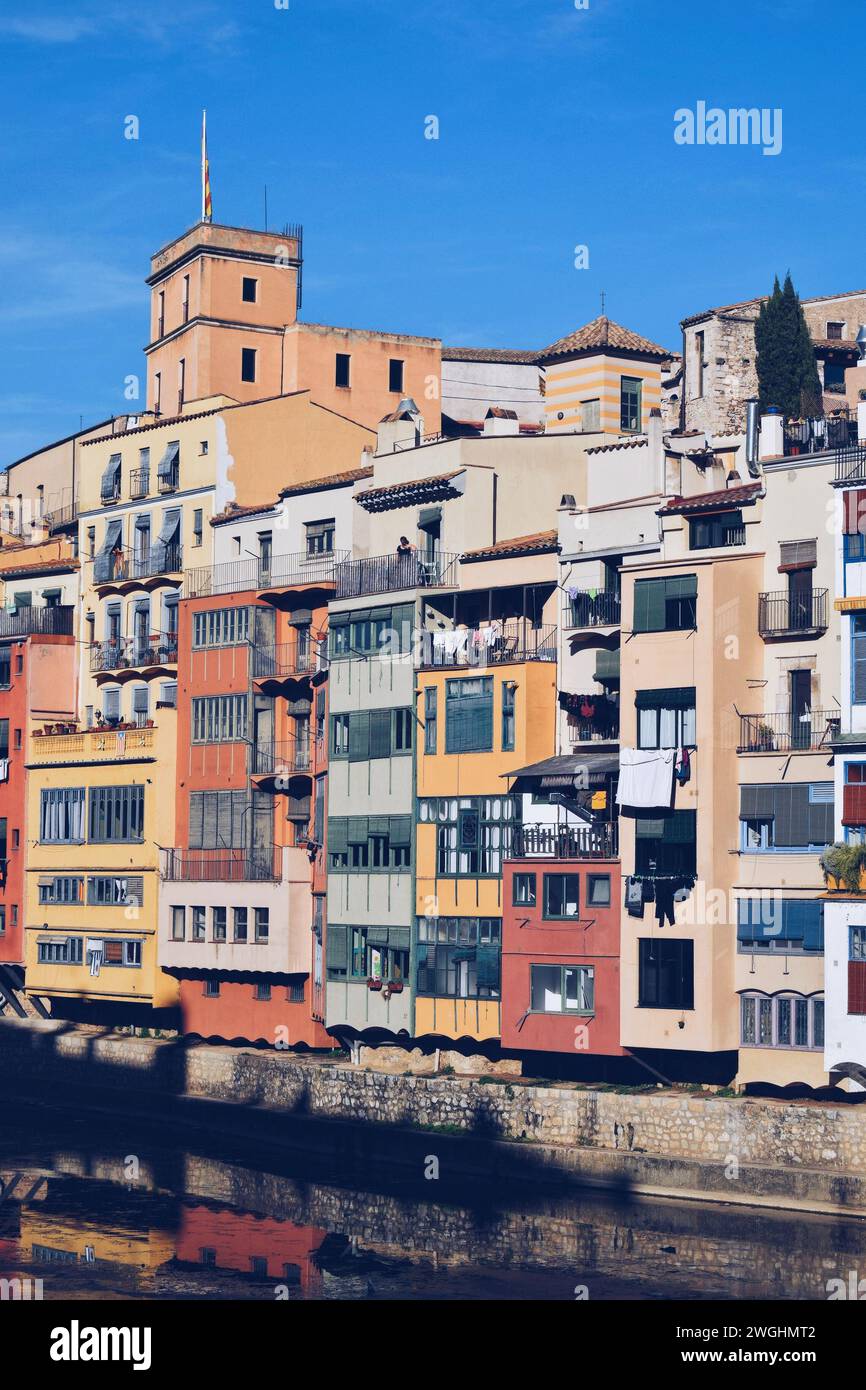 iconic colorful houses on the riverbank in Girona in Catalonia, Spain, on December 9, 2023 Stock Photo