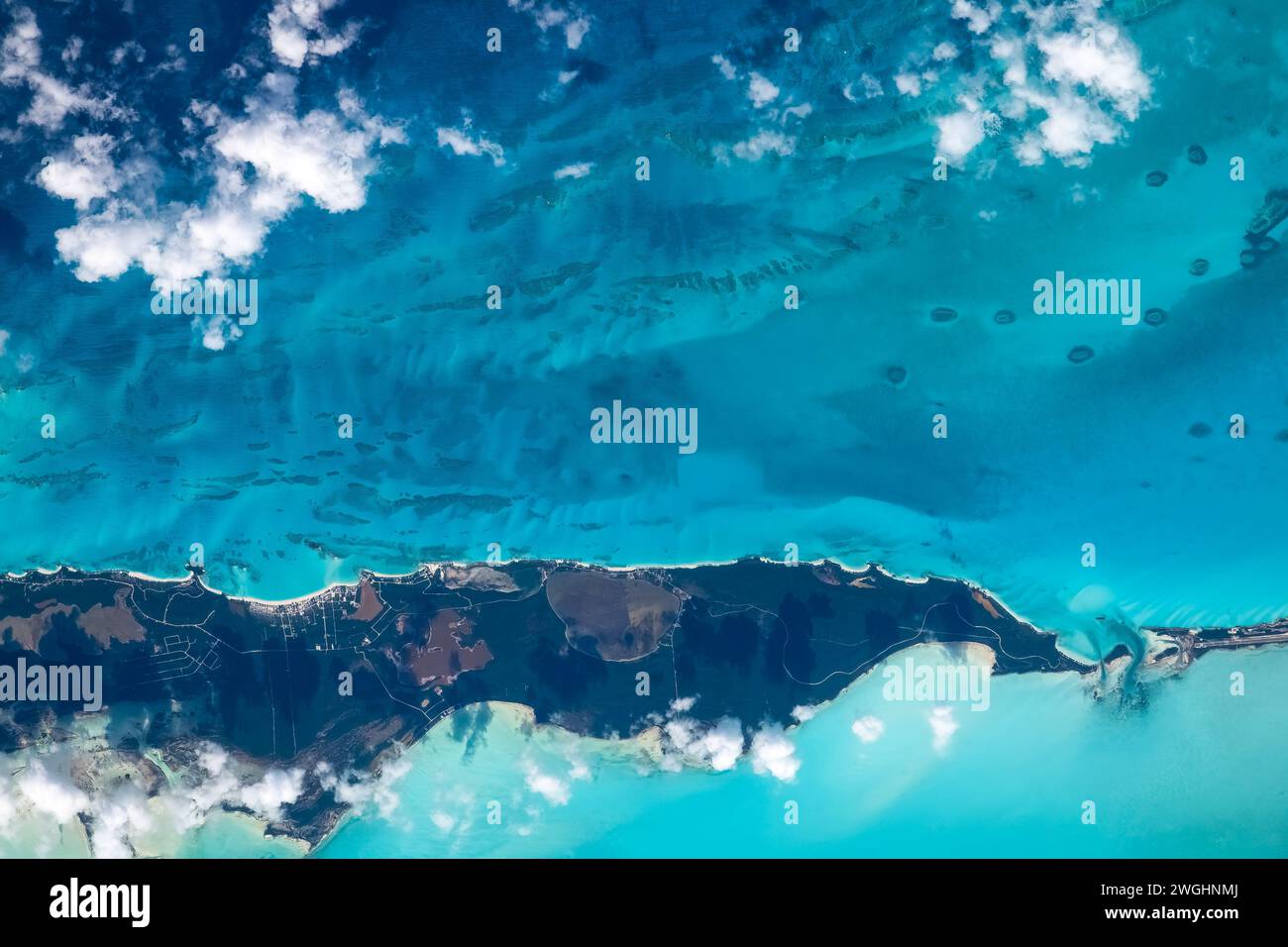 Turquoise sea water and coastline in the Bahamas. Digital enhancemet of an image by NASA Stock Photo