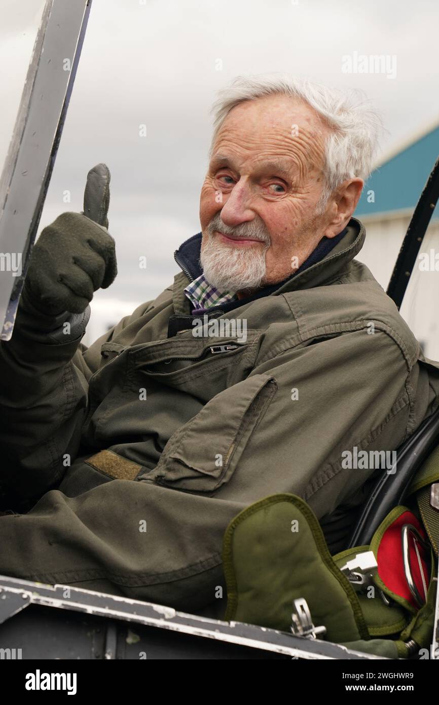 102-year-old Jack Hemmings AFC gives a thumbs up as he lands after flying a Spitfire plane to mark 80th anniversary of the military charity Mission Aviation Fellowship (MAF). The former RAF Squadron Leader and pioneer of MAF, the world's largest humanitarian air service, has become the oldest Briton to fly in a spitfire. Mr Hemmings, who lives at home in Horam, Sussex, was given access to the iconic Heritage Hanger at London Biggin Hill, and took to the skies in Britain's best-loved Second World War aircraft to raise money for MAF, the charity he co-founded almost 80 years ago. Picture date: M Stock Photo