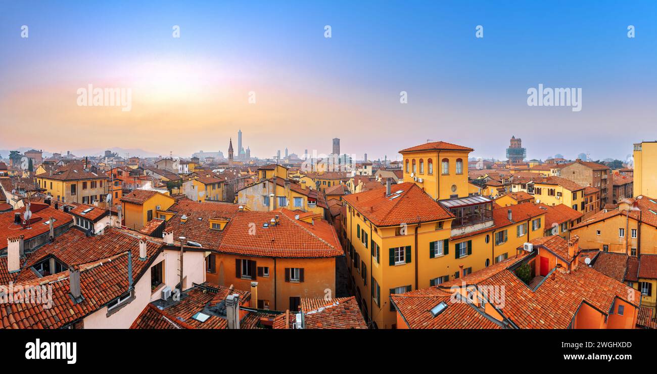 Bologna, Italy rooftop skyline and famous historic towers at dusk. Stock Photo