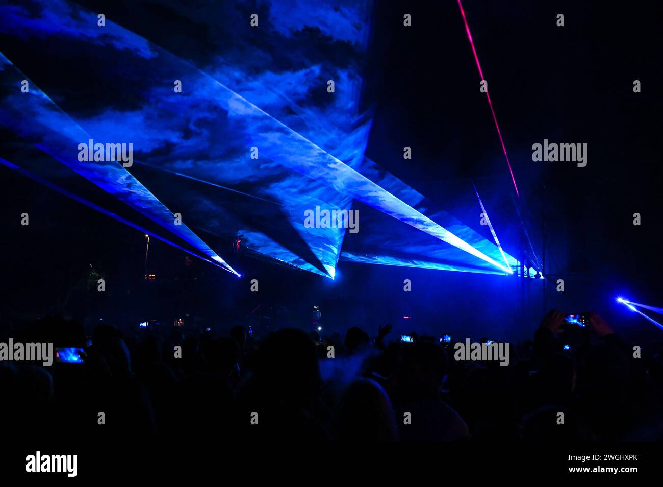 Laser show. Laser lights on the stage during concert. Multicolored