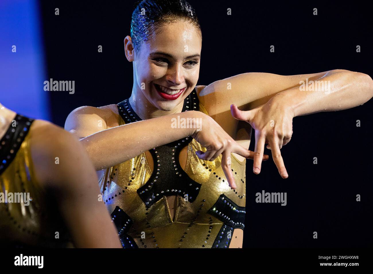 Alisa Ozhogina Ozhogin and Iris Tian Casas of Spain react after winning