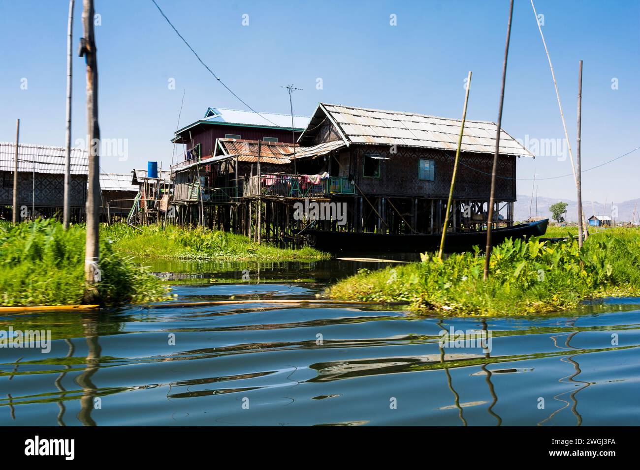 Houses standing on stilts in water Stock Photo Alamy