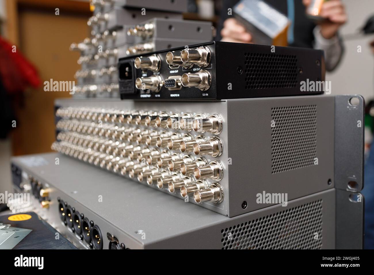 Commutation panel of telecommunication video switcher broadcast for TV channel translation rear view Stock Photo
