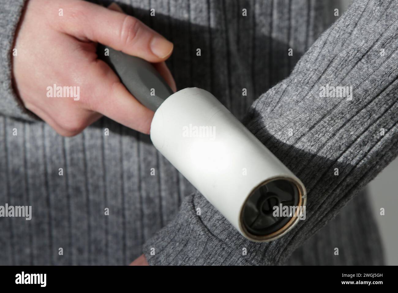 Lint roller hi-res stock photography and images - Alamy