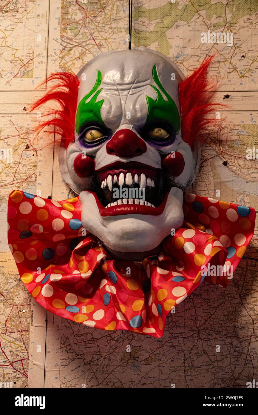 Scary grotesque Clown on display at Halloween. Stock Photo