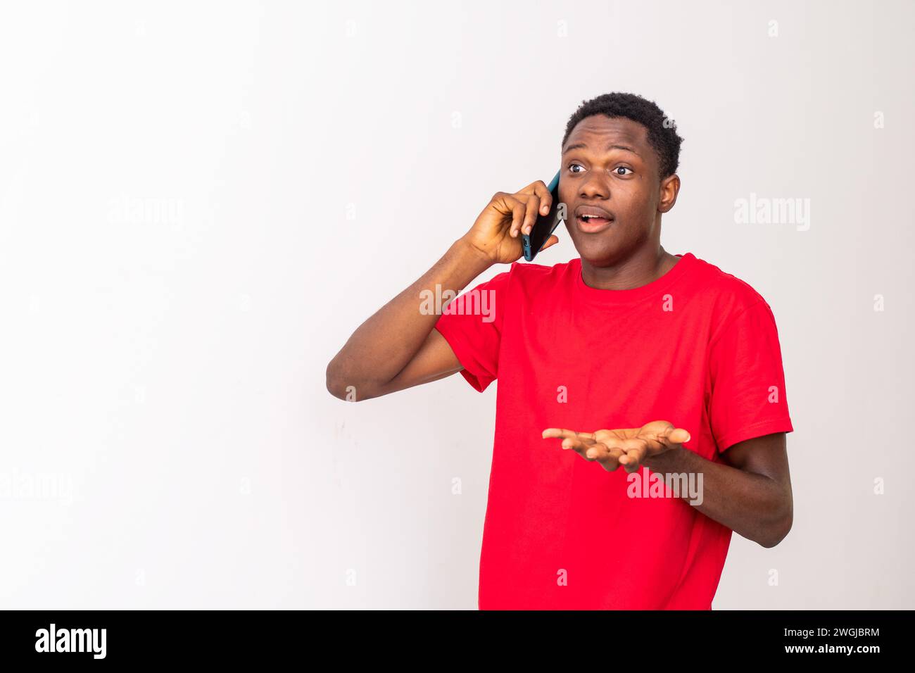 young black man making a phone call Stock Photo