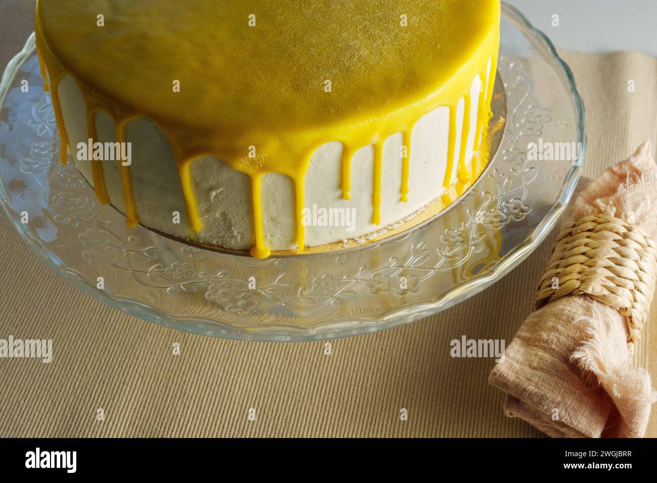 Golden Lemon Glaze Dripping on a Luscious Cake Stock Photo