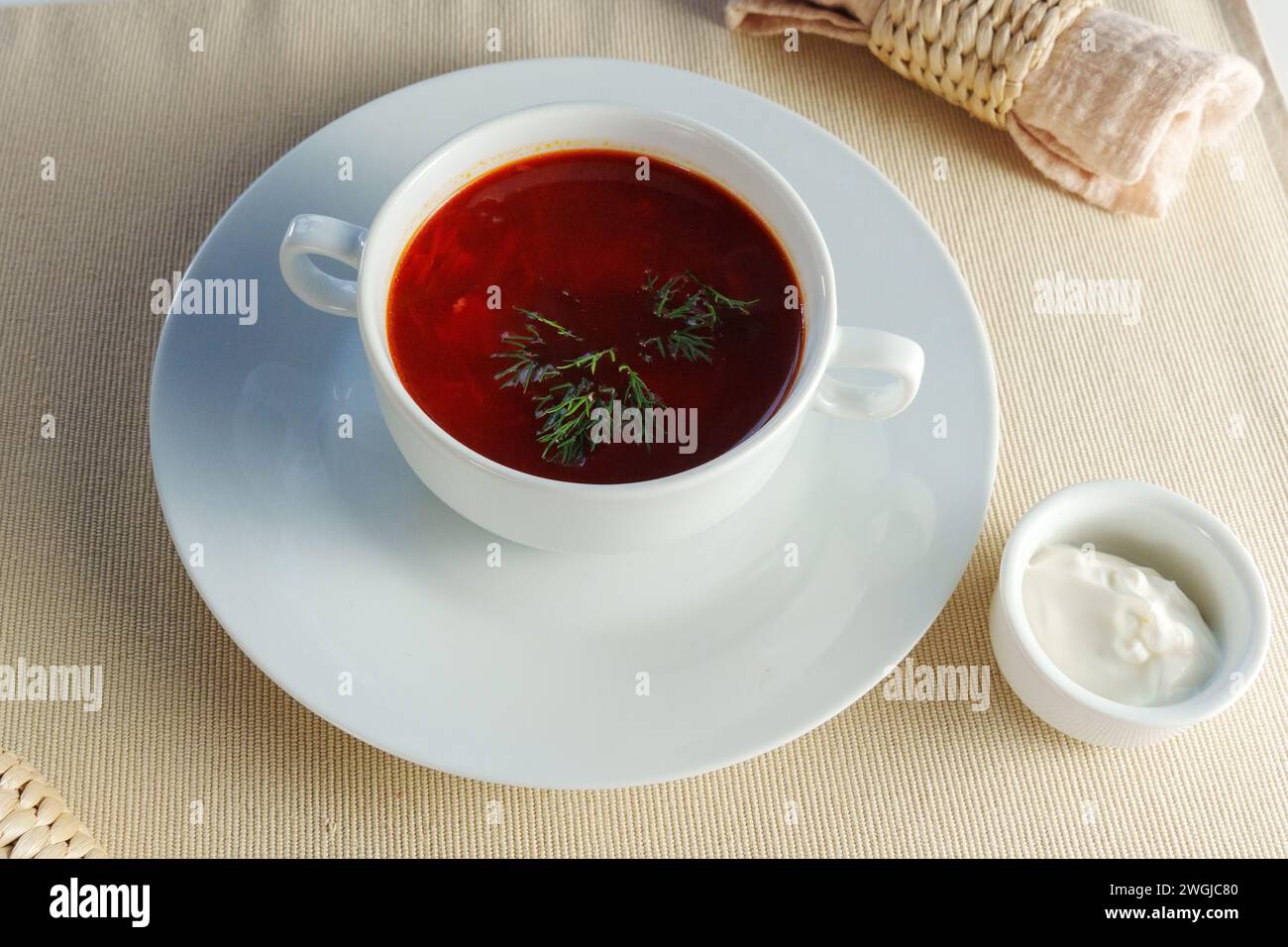 Serenity in a Bowl: Captivating Creamy Tomato Bisque Served With a Gleaming Silver Spoon Stock Photo