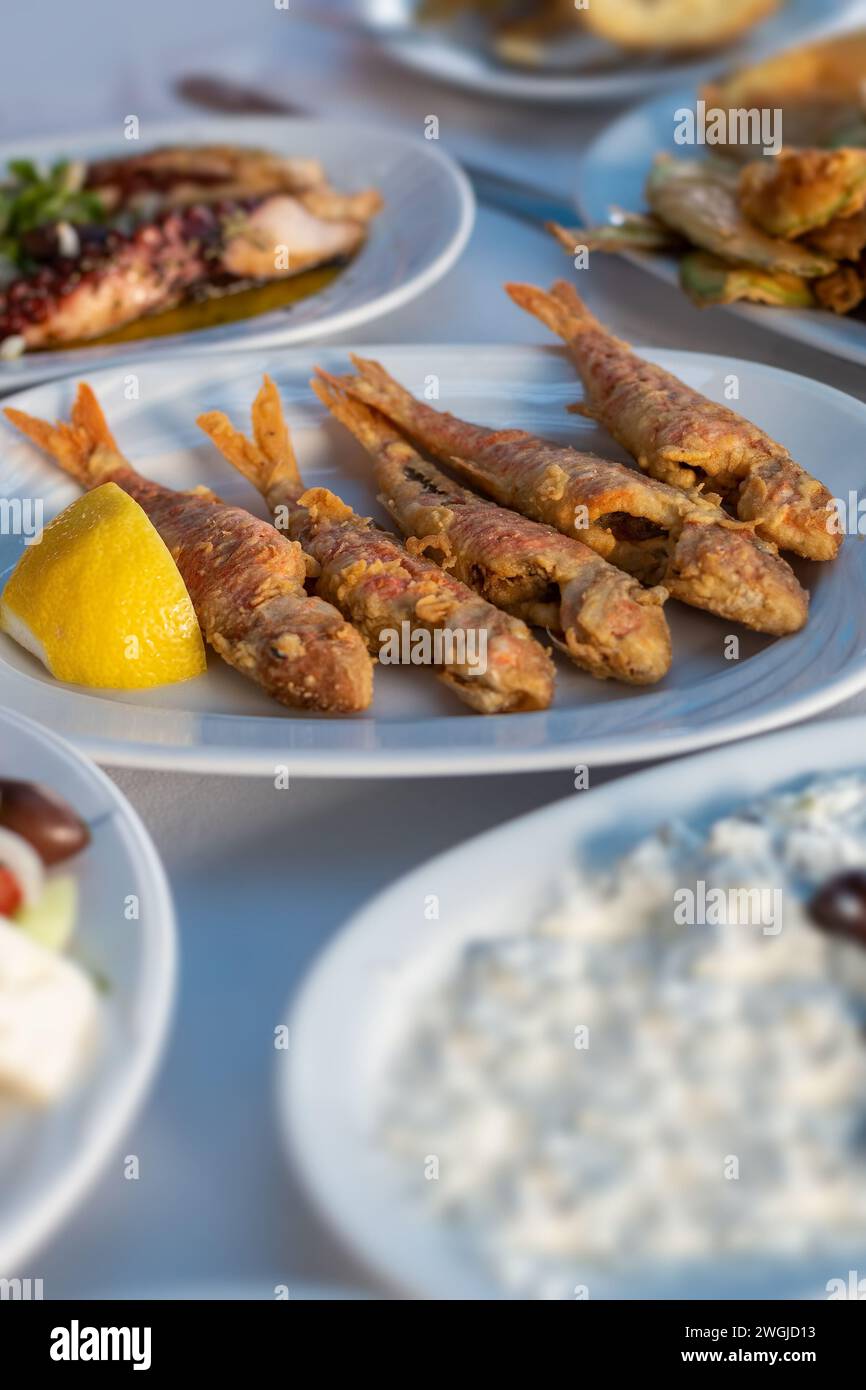 fried red mullet fish plate on table Stock Photo