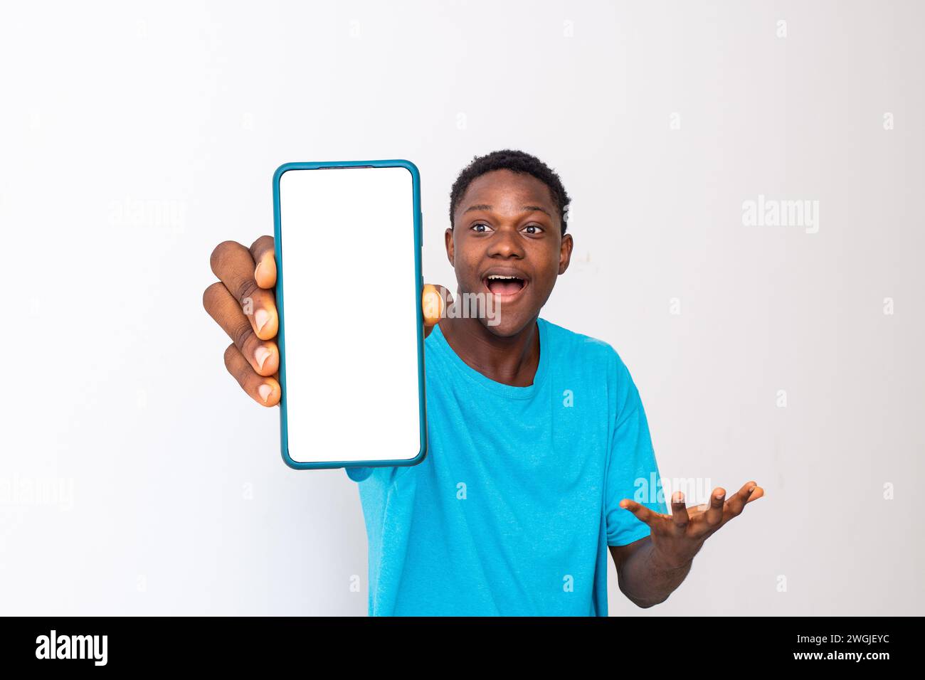 Excited black man showing hi-res stock photography and images - Alamy