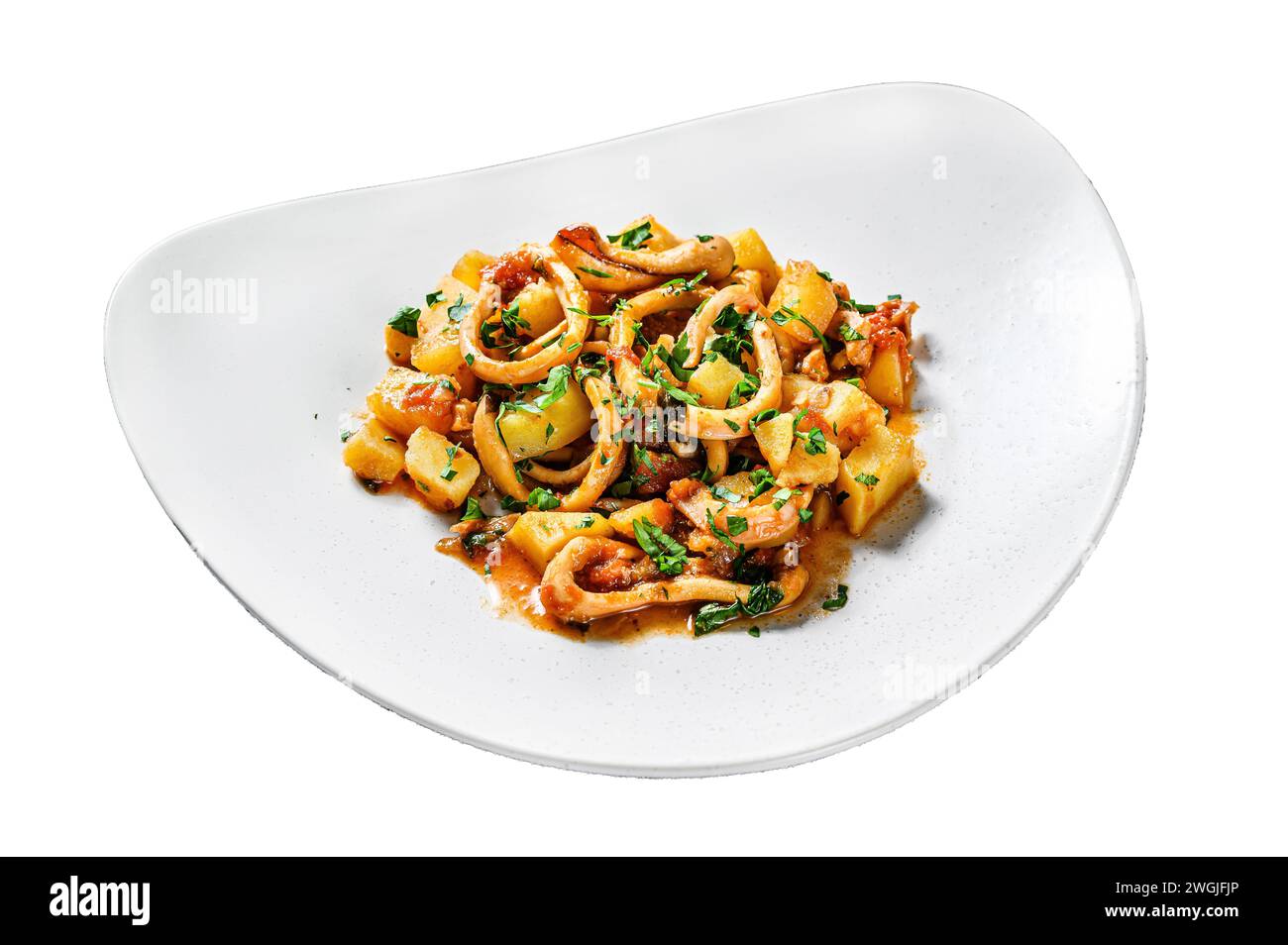 Baked squid with potatoes and tomatoes. Italian cuisine. Isolated on