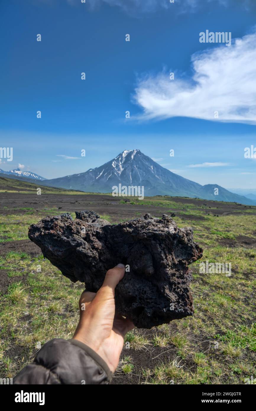 A variety of forms of basalt solidified lava (clinker, block-lava): hawaiian is main type of lava (aa-lava), basalt cellular lava a sample against the Stock Photo