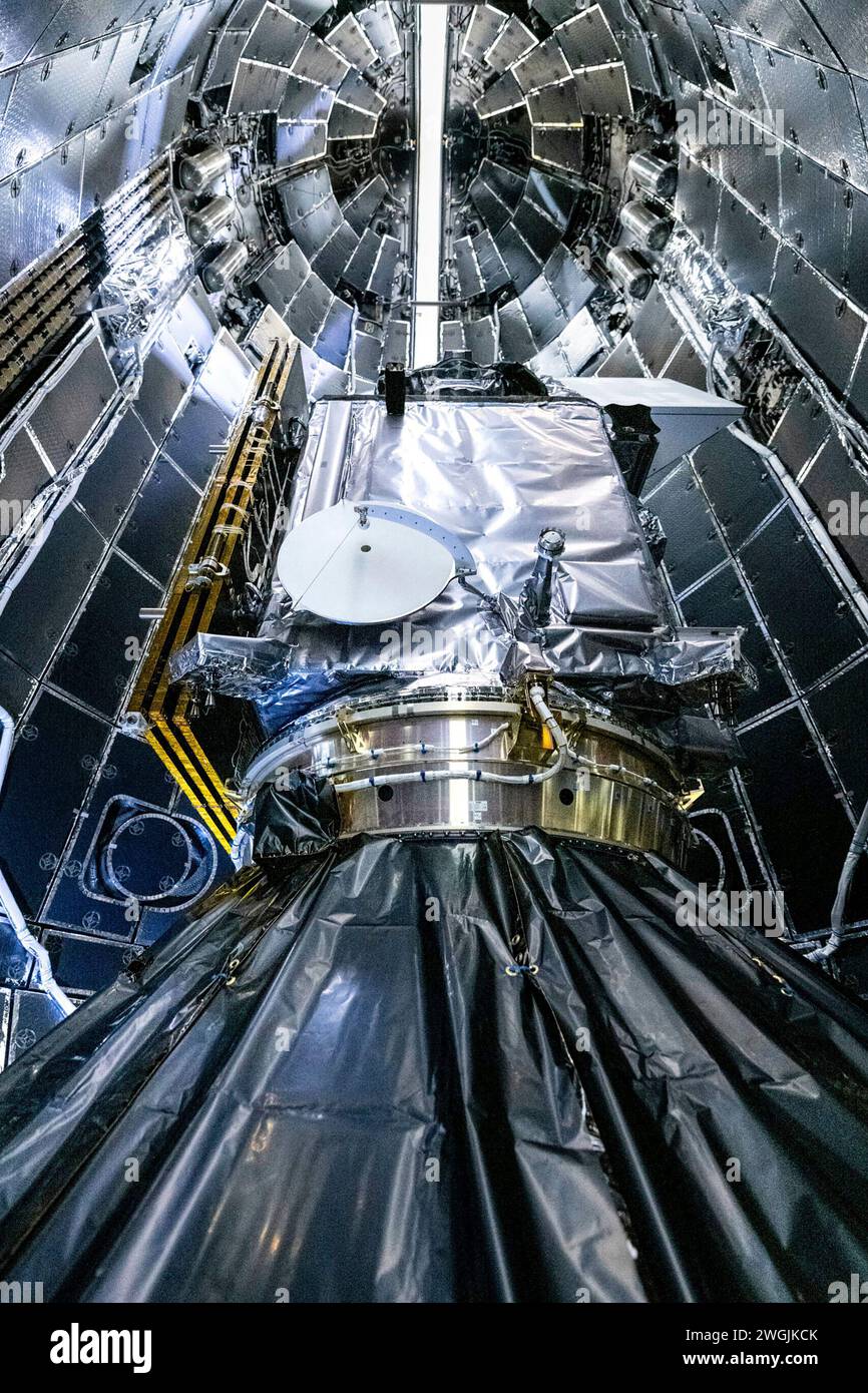 This image provided by NASA shows NASA and SpaceX technicians ...