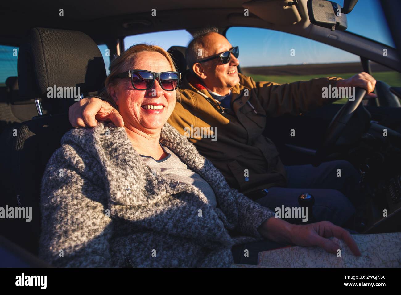 Elderly man driving car hi-res stock photography and images - Alamy