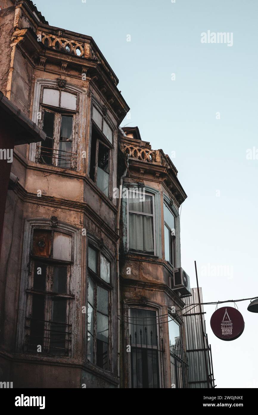 An abandoned hotel building with a faded room number sign in Istanbul ...