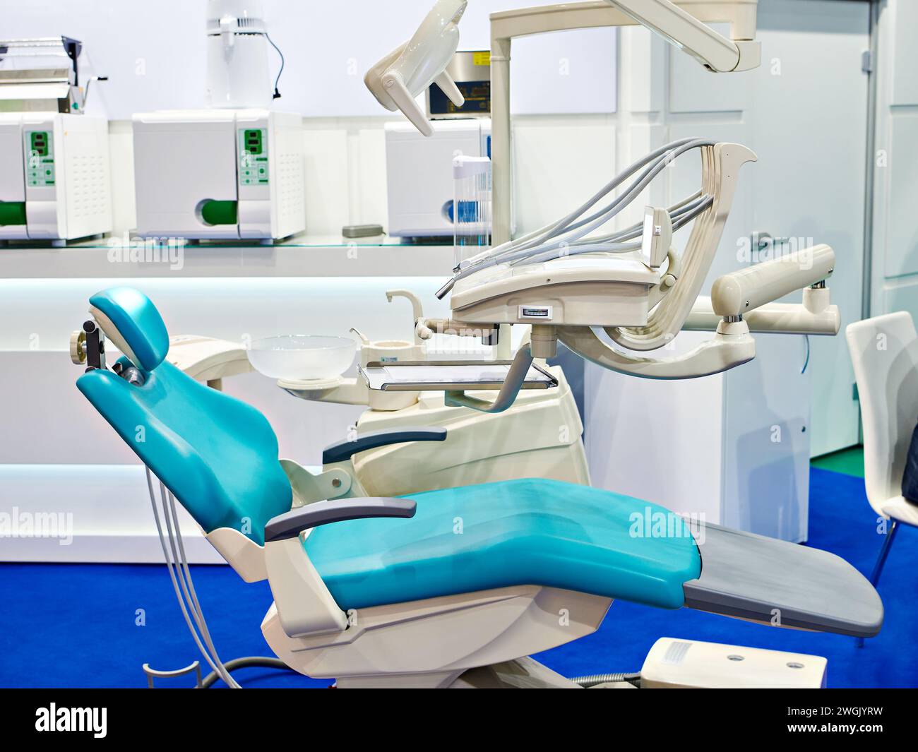 Dental chair and clinic equipment at the exhibition Stock Photo