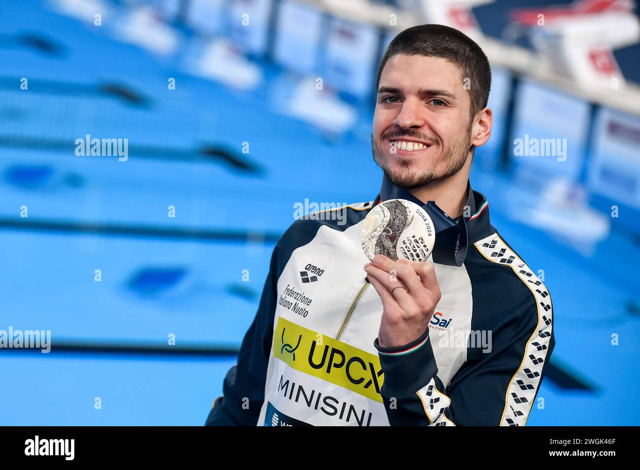 Minisini of Italy shows the silver medal after competing in the