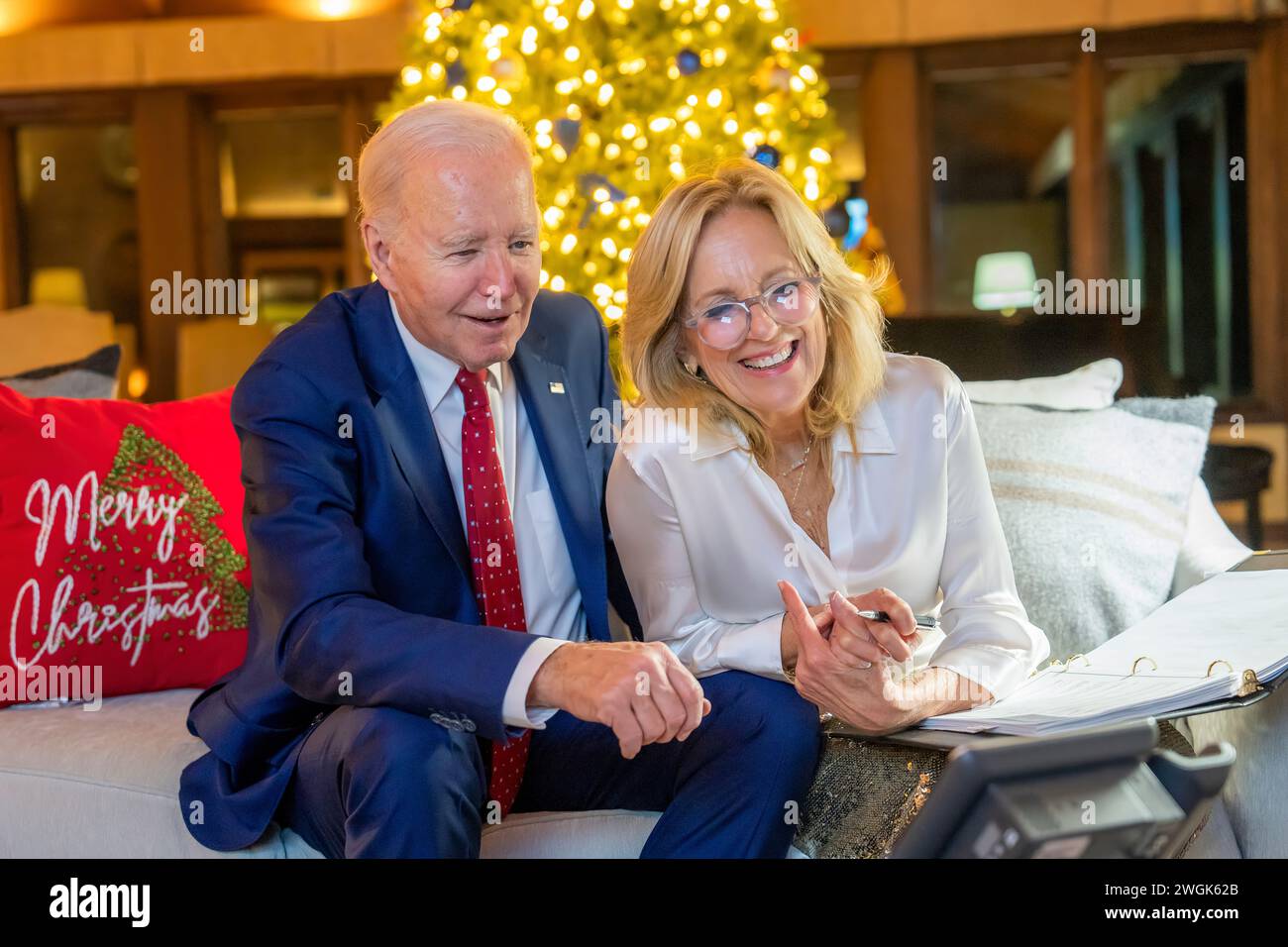 President Joe Biden and First Lady Jill Biden call children while watching the NORAD Santa Tracker at Camp David, Maryland on Sunday, December 24, 2023, where they are spending the Christmas holiday. (Official White House Photo by Adam Schultz) Stock Photo