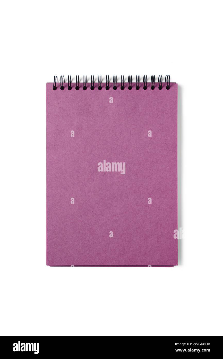 Open spiral bound notepad with craft pink sheets, isolated on white