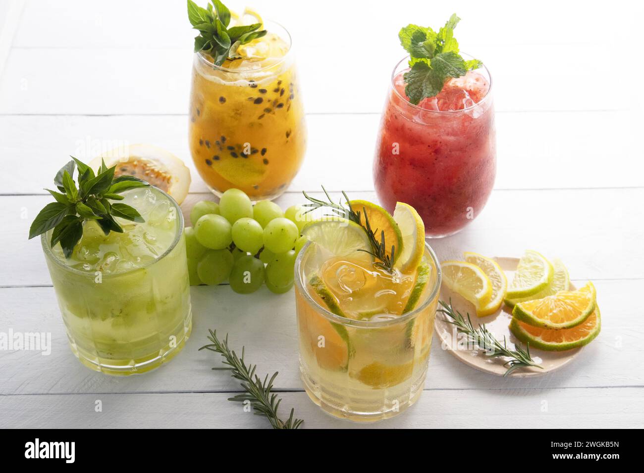 A glass of caipirinha, a typical alcoholic drink from Brazil, made with cachaca or vodka, fruits, ice and sugar Stock Photo