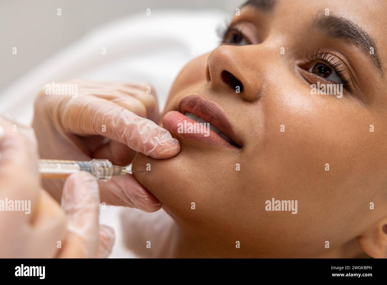 Woman having injection botox hi-res stock photography and images - Alamy
