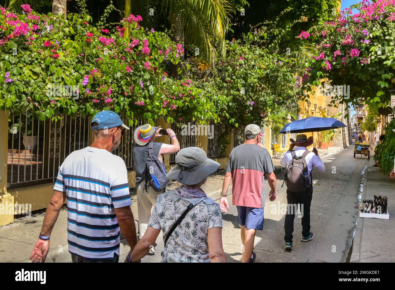 Cartagena, Colombia - 24 January 2024: People in one of the narrow streets in the historic old town of Cartagena. Stock Photo