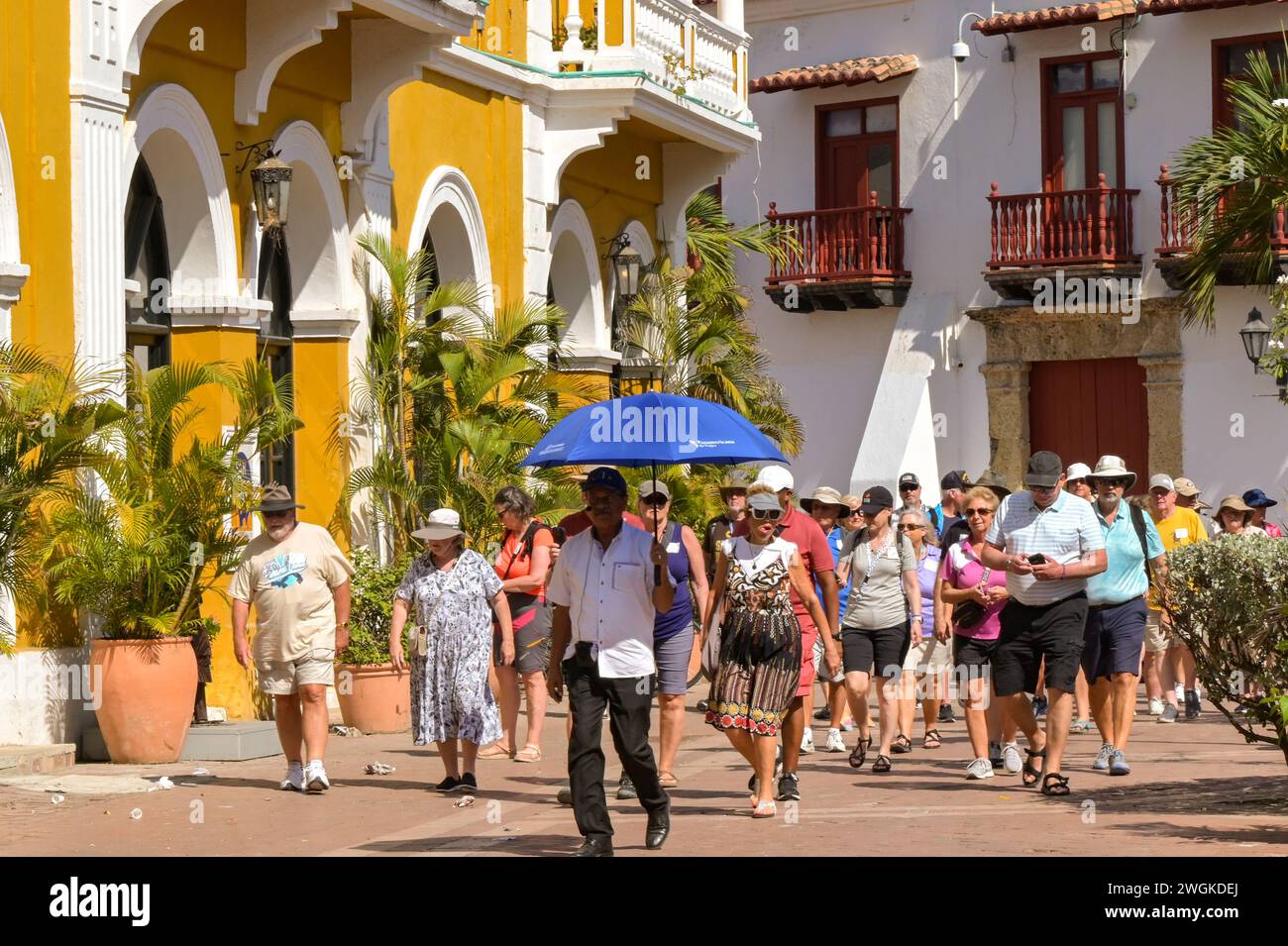 Cartagena, Colombia - 24 January 2024: Tour guide leading a group of visitors around the historic old town of Cartagena. Stock Photo