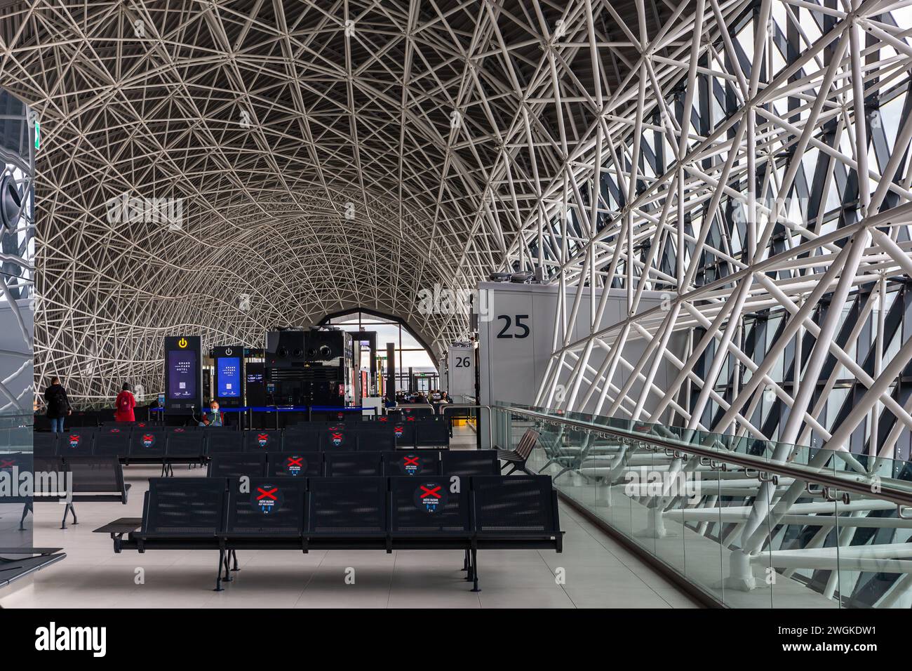 Zagreb, Croatia, 03.10.21. Empty terminal hall with Covid-19 restrictions stickers on the seats in Zagreb Franjo Tudman Airport. Stock Photo
