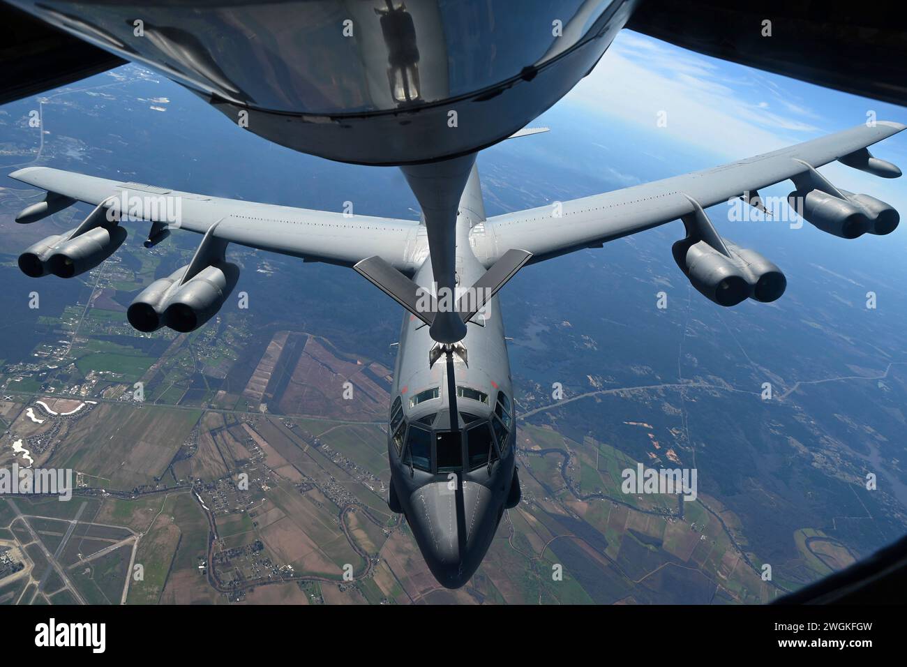, United States. 30 January, 2024. A U.S. Air Force B-52 Stratofortress strategic bomber aircraft from the 11th Bomb Squadron, refuels from a KC-135 Stratotanker aircraft after refueling, January 30, 2024 over the Southern United States. Credit: SrA Jessica Do/US Air Force/Alamy Live News Stock Photo