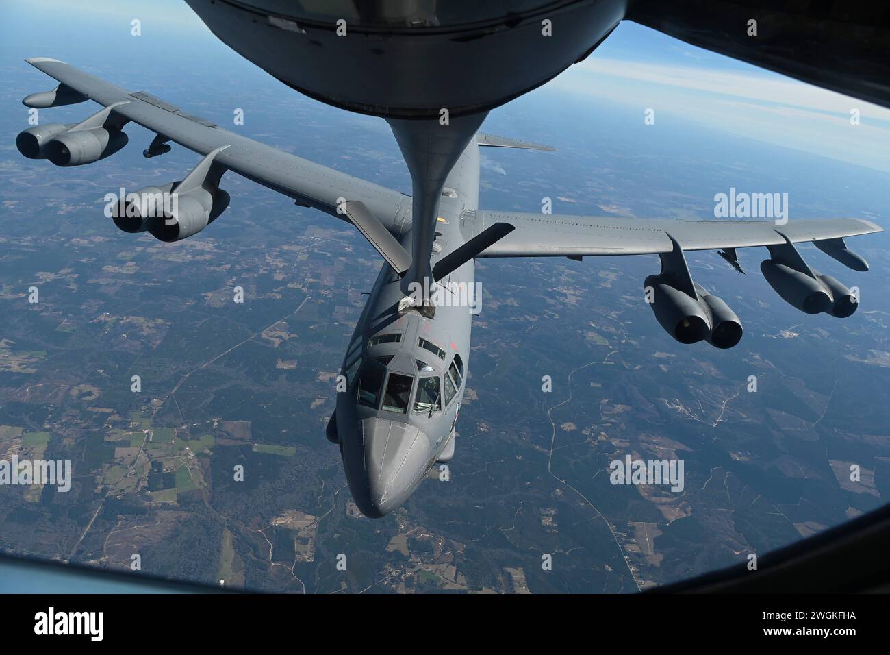 , United States. 30 January, 2024. A U.S. Air Force B-52 Stratofortress strategic bomber aircraft from the 11th Bomb Squadron, refuels from a KC-135 Stratotanker aircraft after refueling, January 30, 2024 over the Southern United States. Credit: SrA Jessica Do/US Air Force/Alamy Live News Stock Photo