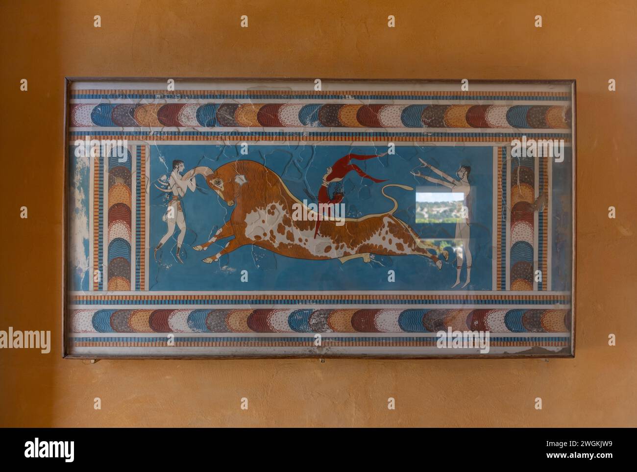 A picture of the Bull-Leaping Fresco at the Knossos Palace, on the second story of the Throne Room. Stock Photo
