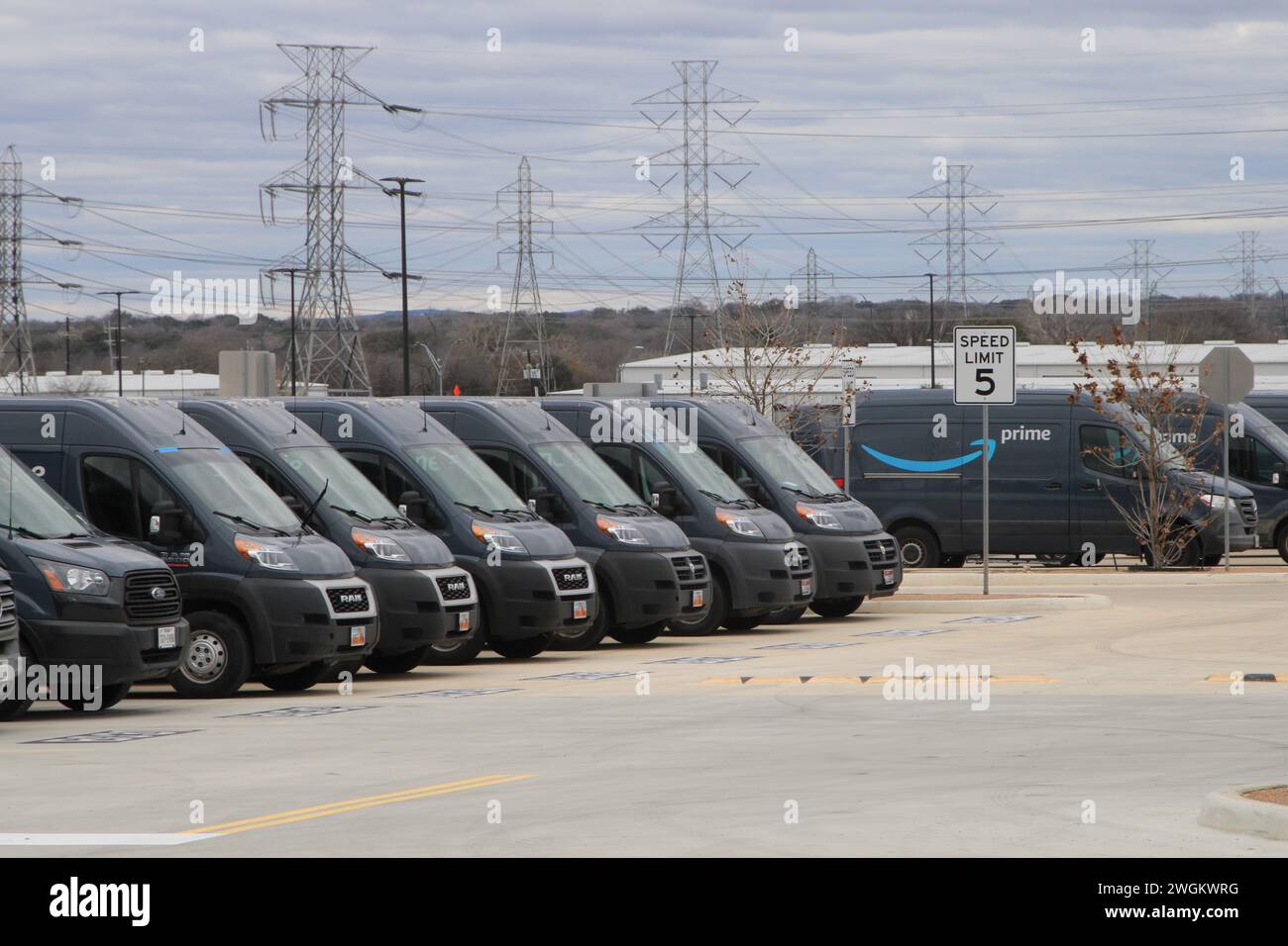 San Antonio, USA. 05th Feb, 2024. Amazon delivery vehicles parked outside the DSX8 Amazon facility at 11602 Tech Com Drive in San Antonio, Texas, USA, on February 5, 2024. Amazon was founded in the year 1994 and is now the second-largest private employer in America. (Photo by Carlos Kosienski/Sipa USA) Credit: Sipa USA/Alamy Live News Stock Photo