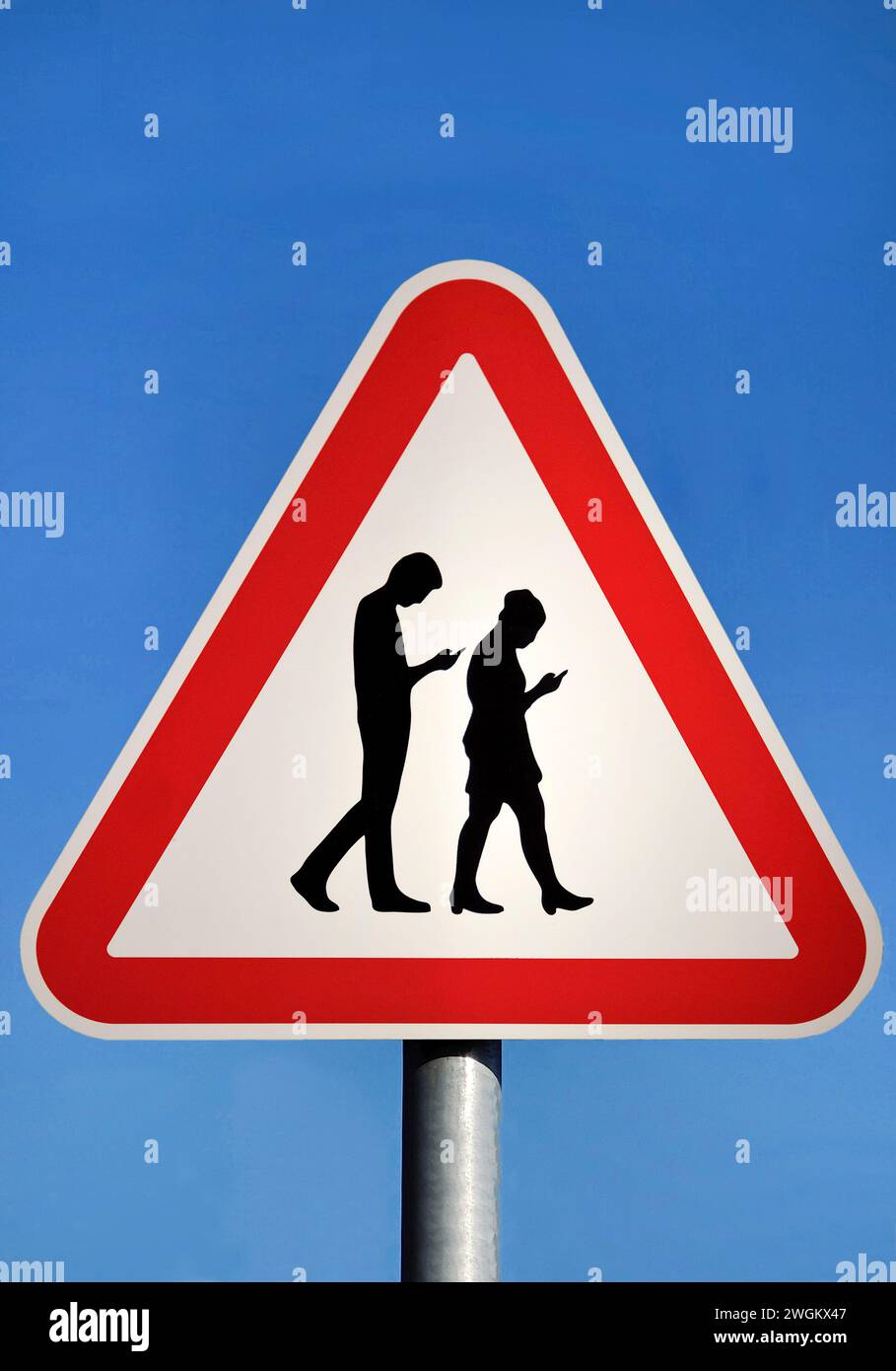 Fictitious traffic sign Danger from cell phone users, photomontage Stock Photo