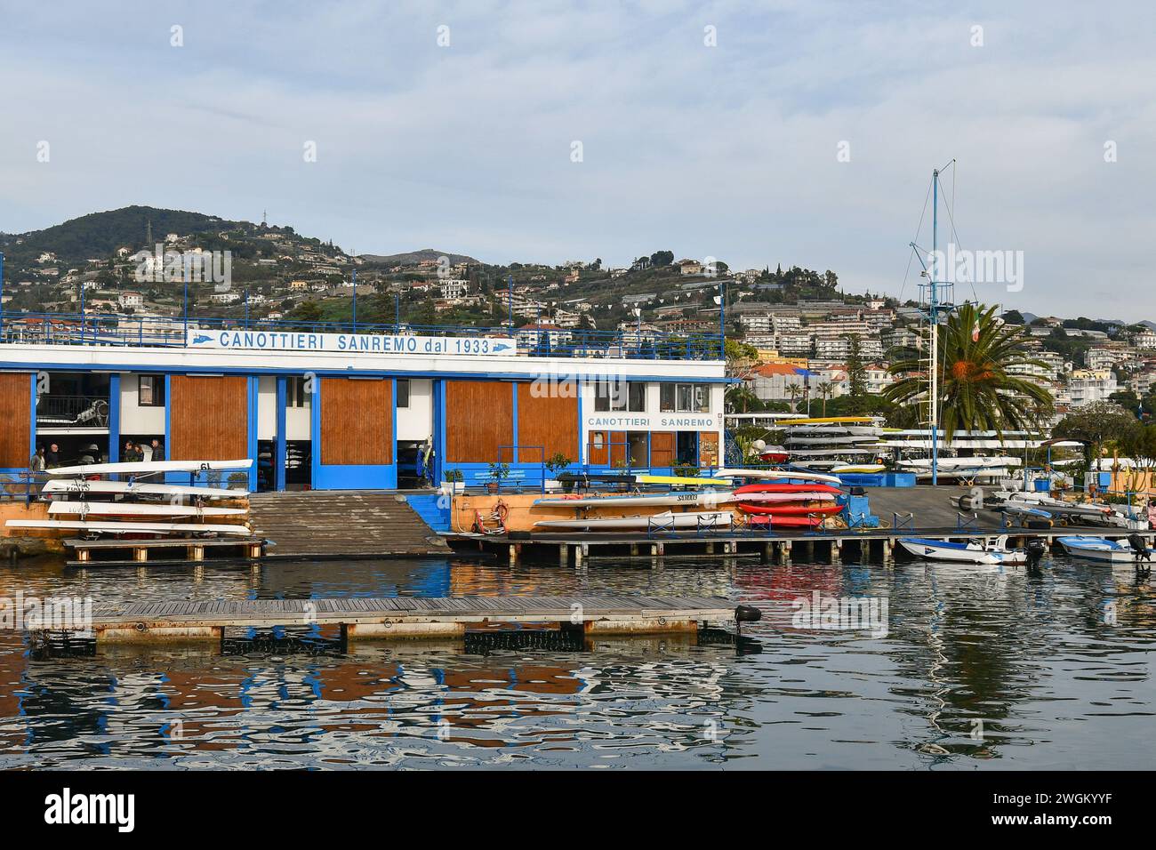 Exterior of the Sanremo Rowing Club, active since 1933, in the Old Port, Sanremo, Imperia, Liguria, Italy in a cloudy day Stock Photo