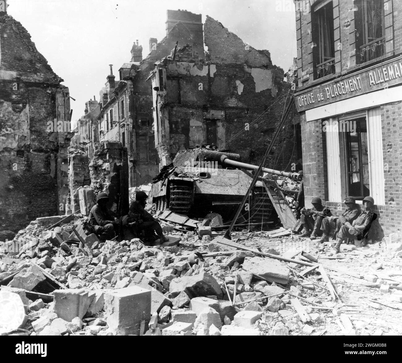 Knocked out Tiger [sic] tank, the last vehicle abandoned by the Germans in their flight from Argentan, France, in the face of terrific American assault which liberated the town. 20 August, 1944. Stock Photo