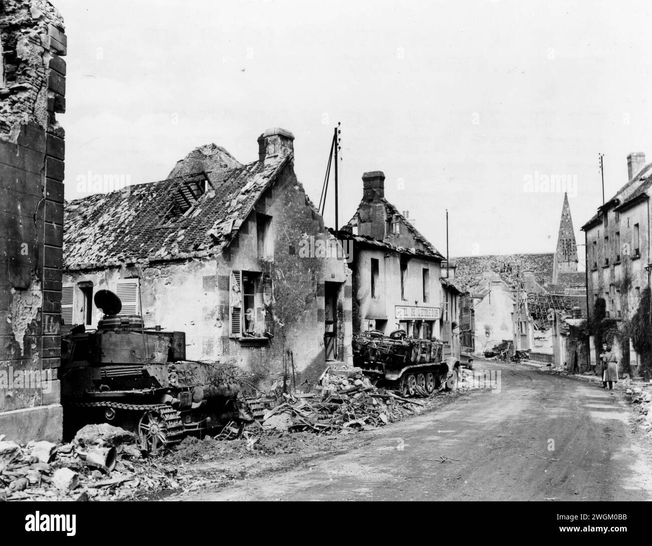 The wreckage of some of the German armor that tried to stay and fight it out with the advancing Americans in Chambois, strews the streets of that town. France. 21 August, 1944. Stock Photo