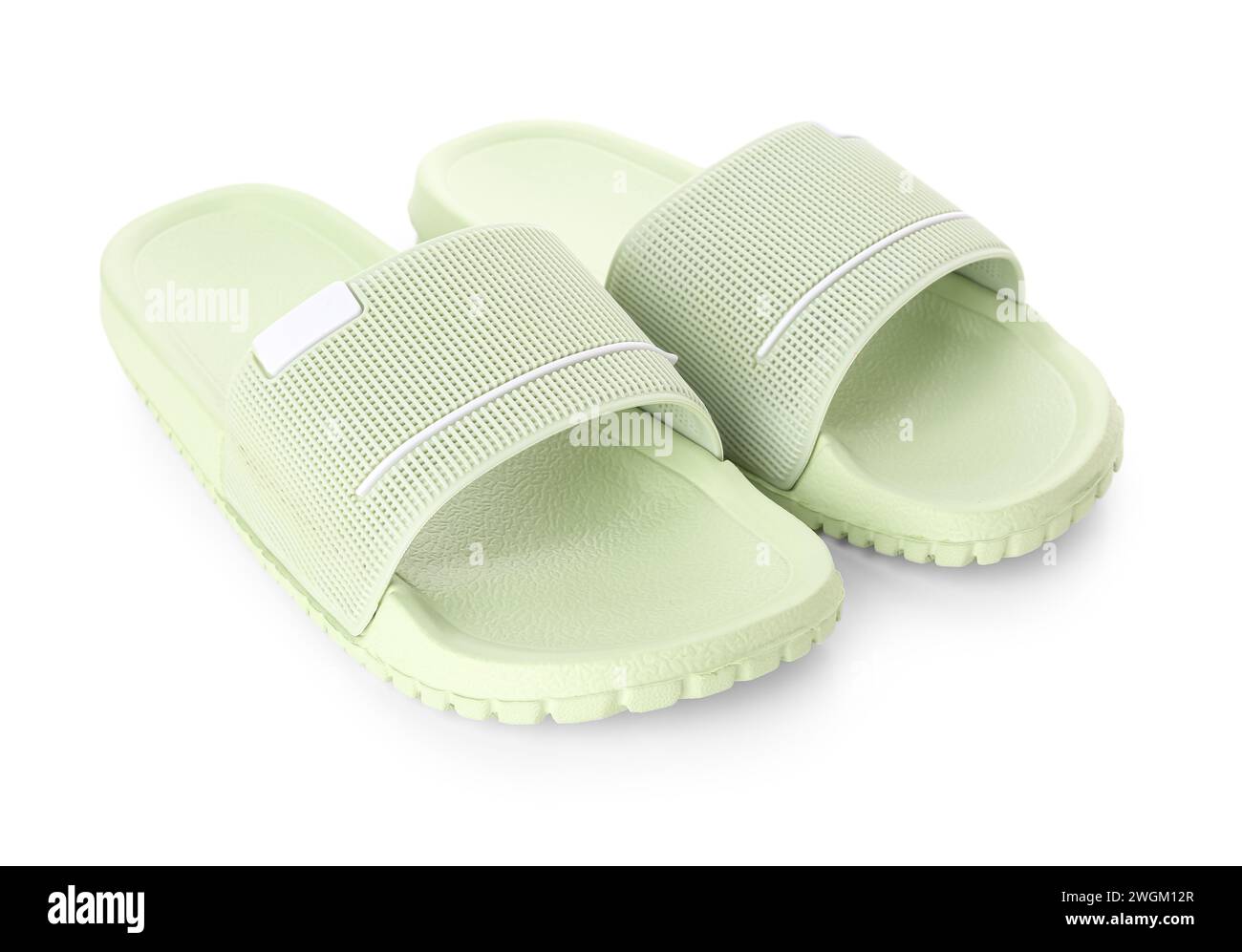 Green female flip flops on white background Stock Photo - Alamy