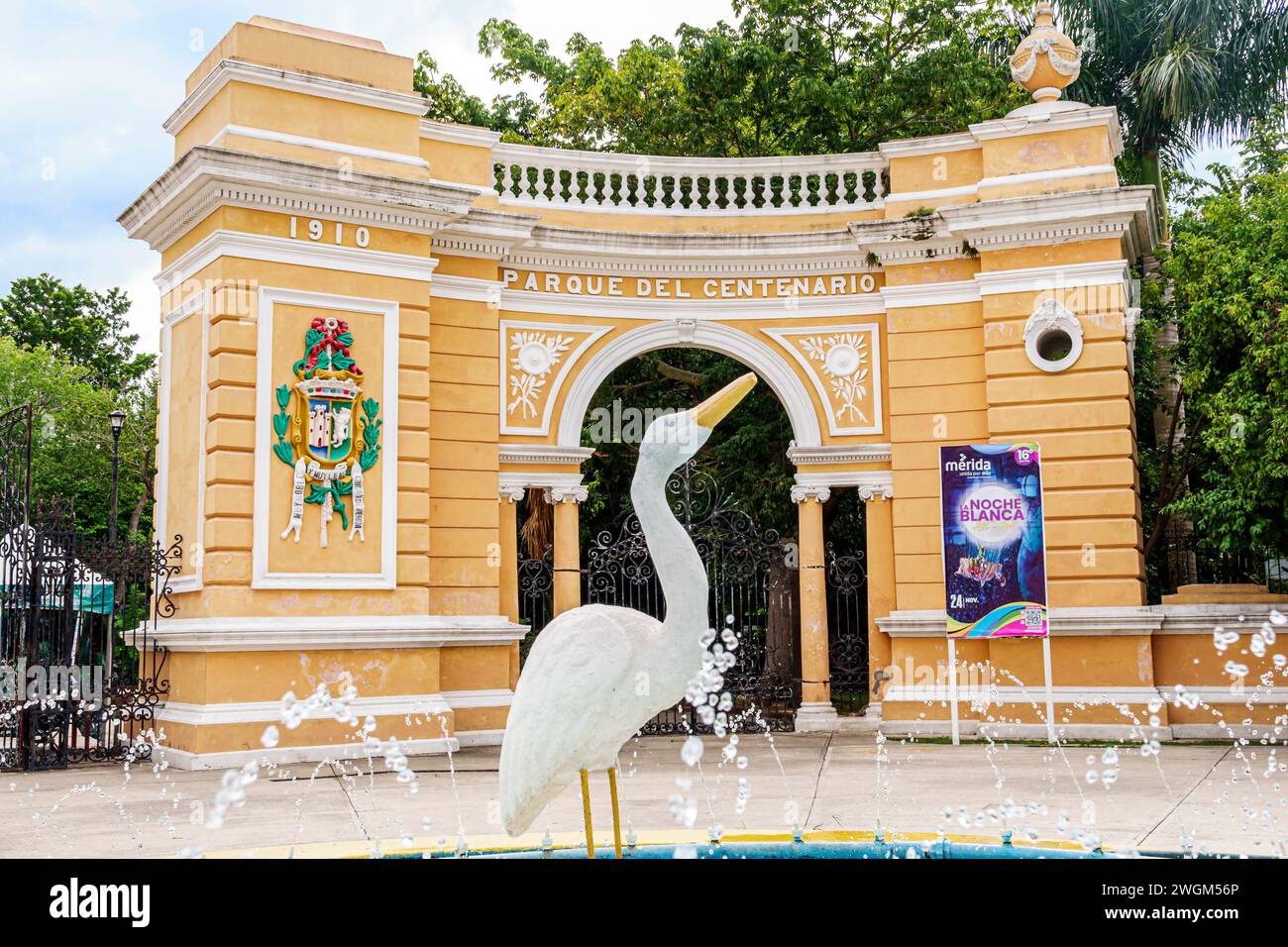 Merida Mexico,Parque Zoologico del Centenario centennial public park,entrance arch,public fountain white egret bird statue,coat of arms shield city,Me Stock Photo