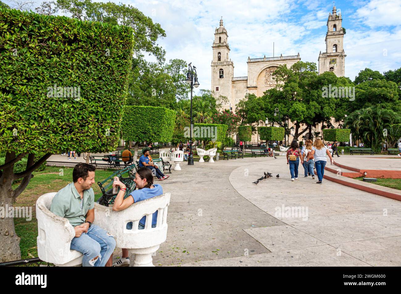 Merida Mexico,Centro Historico historic center centre district,Plaza Grande,confidente chairs seats,man men male,woman women lady female,adult adults Stock Photo