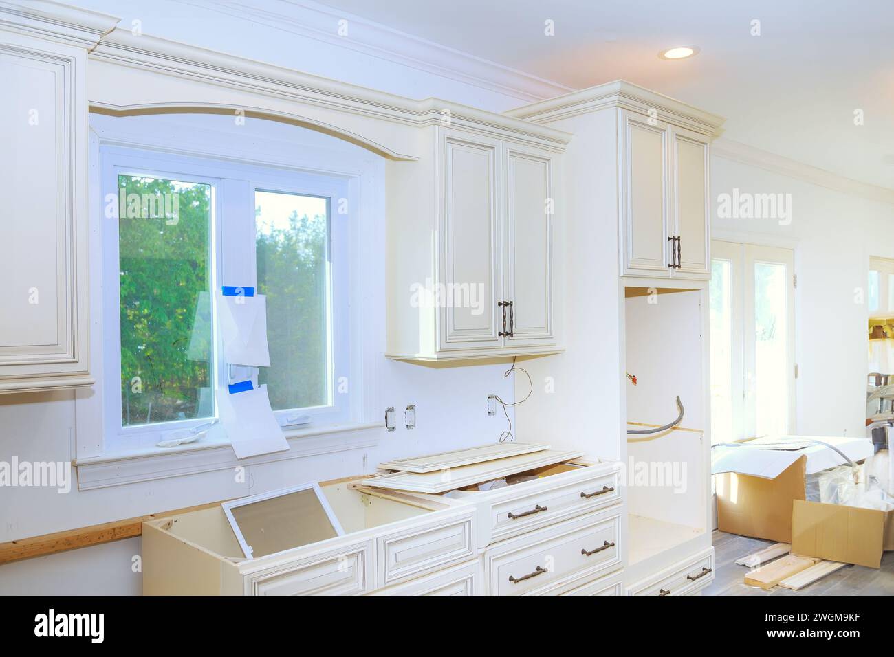 Installation kitchen cabinets assembling hi-res stock photography and ...